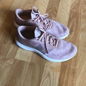 Pink and silver Nike flex contact